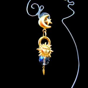 Gold tone sun,moon & stars pierced earrings